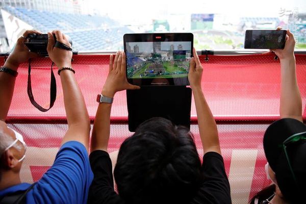 تصاویری از تماشای مسابقات المپیک 2021  از راه دور