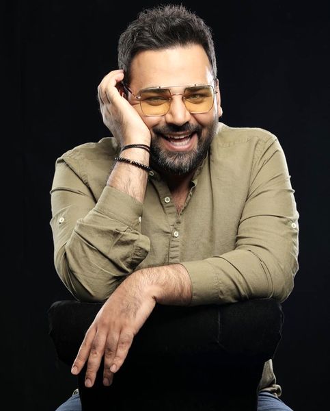 خنده های زیبا احسان‌علیخانی + عکس