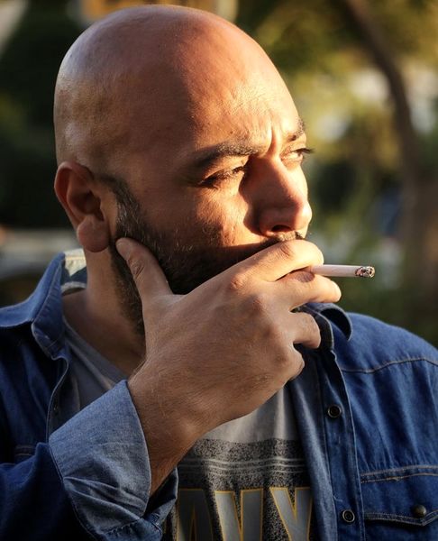 سیگار کشیدن مهدی کوشکی + عکس