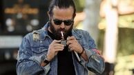 هومن سیدی در حال سیگار کشیدن در خیابان + عکس