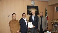 اهدای حکم سرپرستی فدراسیون کشتی به بنی تمیم توسط اسبقیان