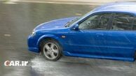 چرا در باران لیز میخوریم؟ پدیده آب سواری چیست؟