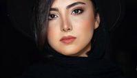 عکس آتلیه ای زیبا کرمعلی با گلهایش 