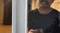رضا مولایی در پشت پنجره خانه اش + عکس