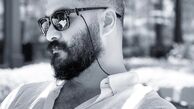 چهره در فکر فرورفته میلاد کی مرام + عکس