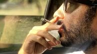 سیگار کشیدن نوید محمدزاده در ماشینش + عکس